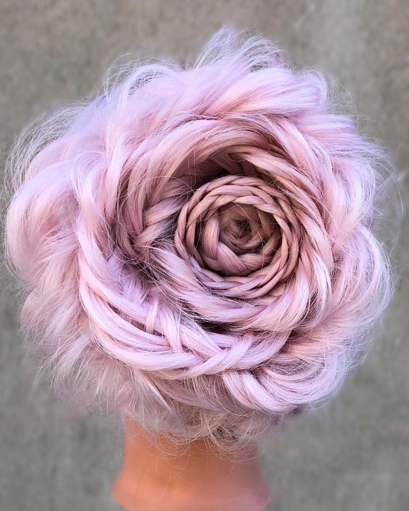 Rose braid updo with pink flowers