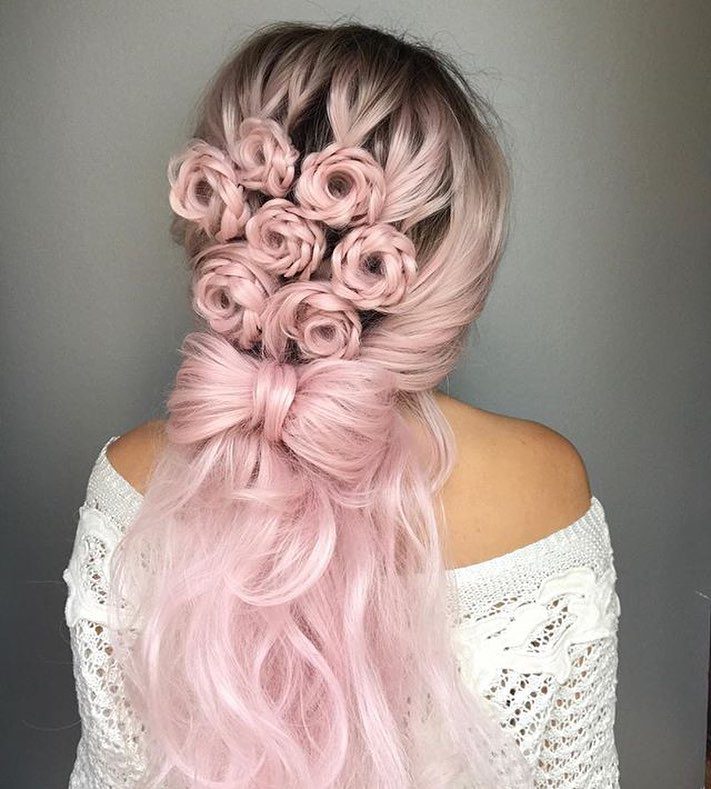 Braided rose bun with hair accessory
