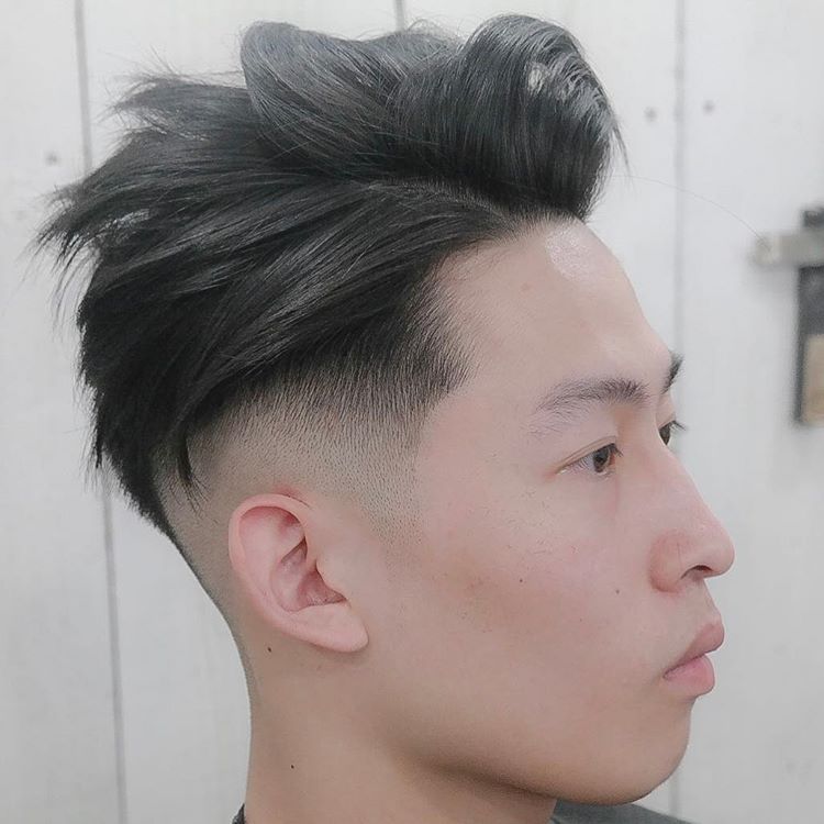 Side Part Hairstyle With Texture And Low Fade