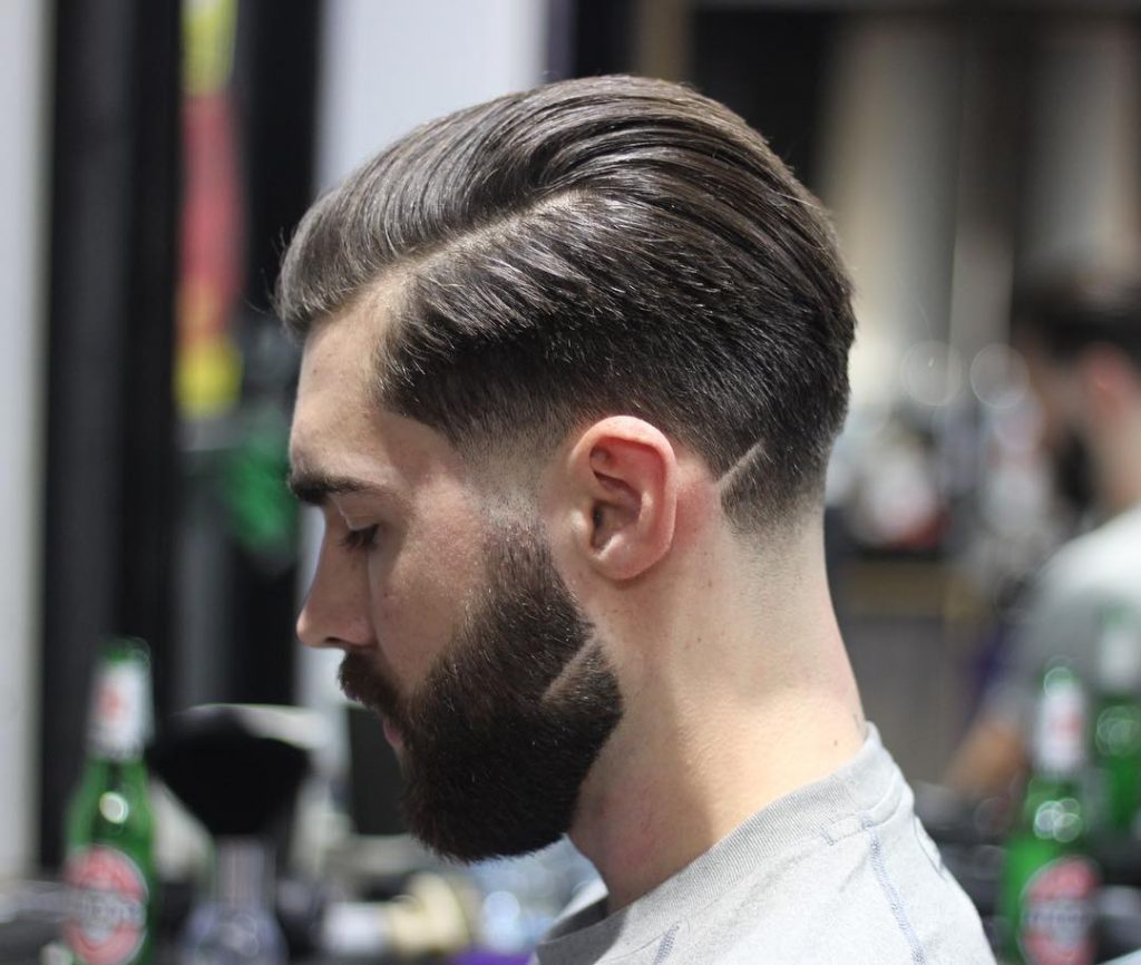 Cool beard style with comb backed hair